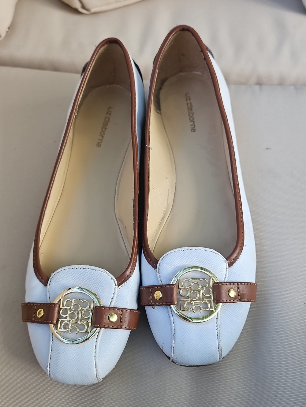 Liz Claiborne White Flats with Brown Trim and Gold Logo Accent